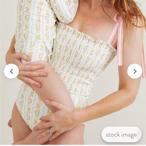 Brand new with tag (NWT) women's linear citrus smocked one piece by minnow pink